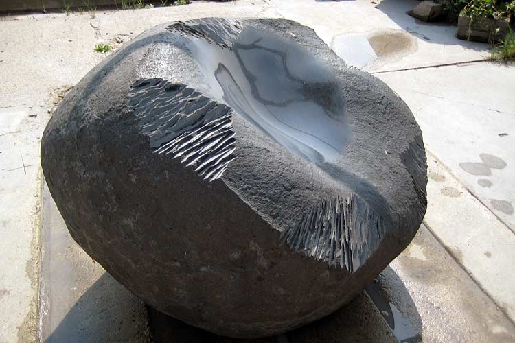 Water and stone - life and a tombstone.